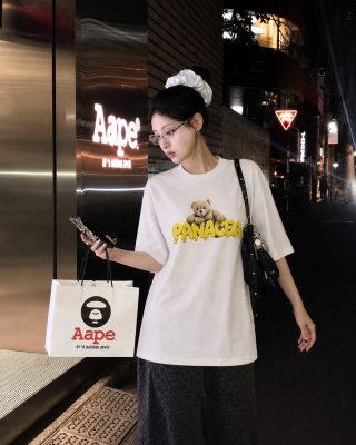 ao phong nam nu hinh chu gau vang
